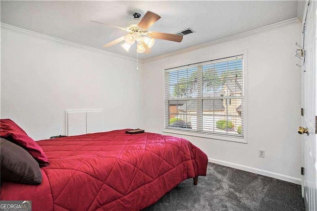 carpeted bedroom with ornamental molding, a ceiling fan, visible vents, and baseboards