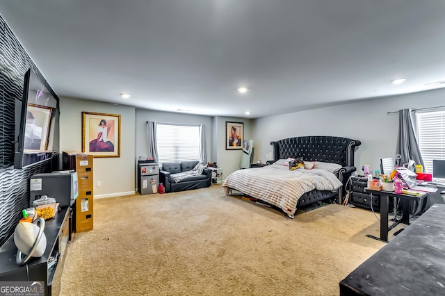 carpeted bedroom with recessed lighting, visible vents, and baseboards