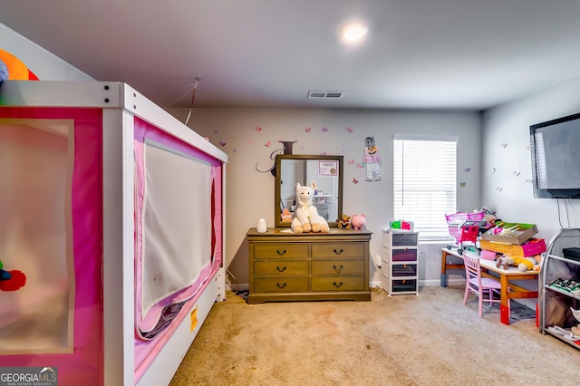 game room with visible vents, baseboards, and carpet