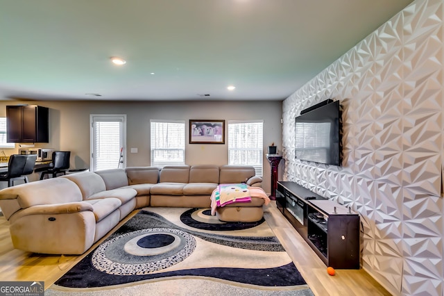 living room featuring recessed lighting and light wood-style flooring