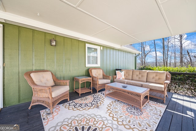 wooden deck with outdoor lounge area