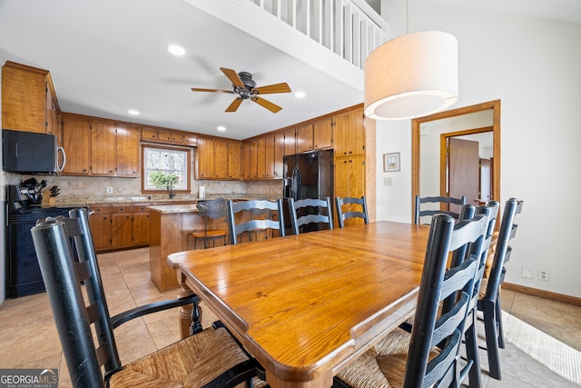 dining area featuring recessed lighting, ceiling fan, baseboards, and light tile patterned floors