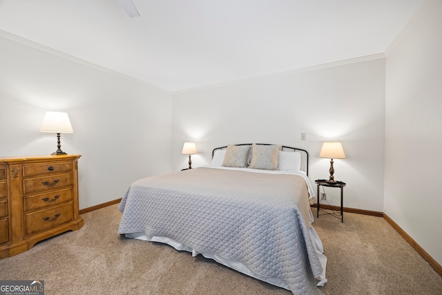 bedroom featuring baseboards, ornamental molding, and light colored carpet