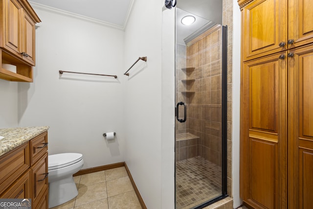 full bathroom with toilet, ornamental molding, a stall shower, baseboards, and tile patterned floors