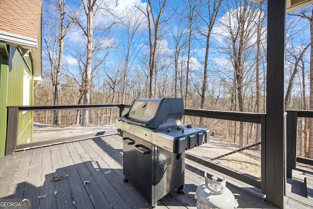 deck featuring a grill