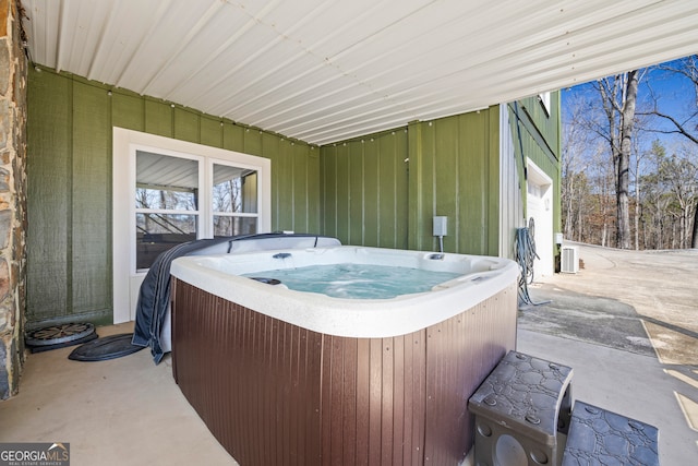 view of patio featuring a hot tub