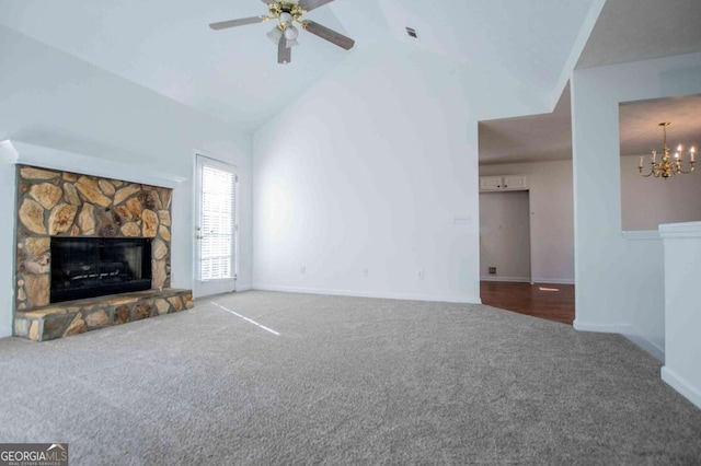 unfurnished living room with baseboards, carpet flooring, a fireplace, high vaulted ceiling, and ceiling fan with notable chandelier