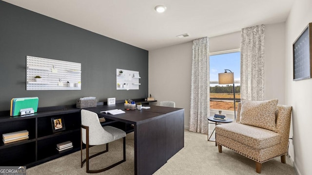 home office featuring carpet flooring and visible vents