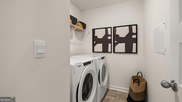 laundry room with laundry area and washer and clothes dryer