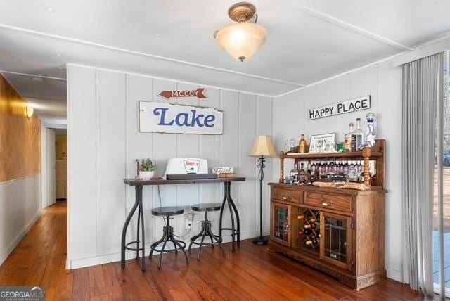 bar featuring hardwood / wood-style floors