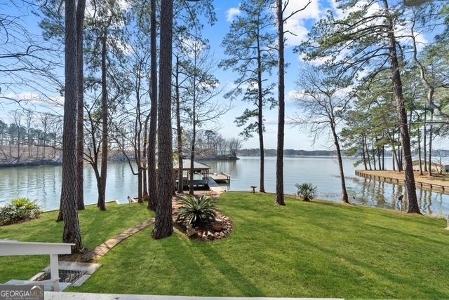 view of water feature with a boat dock