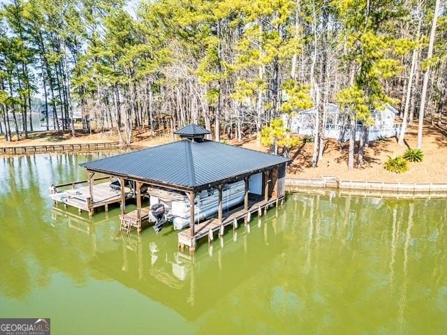 view of dock with a water view