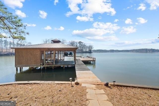 view of dock with a water view