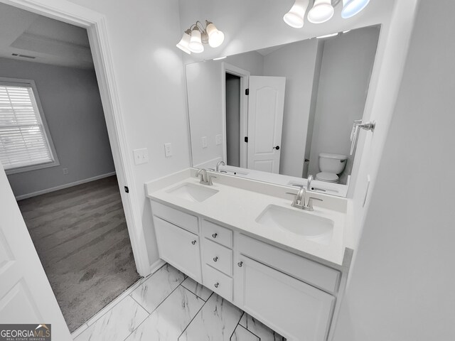 1235 Park Pass Way, Suwanee, GA 30024 - full bath with marble finish floor, a sink, toilet, and double vanity