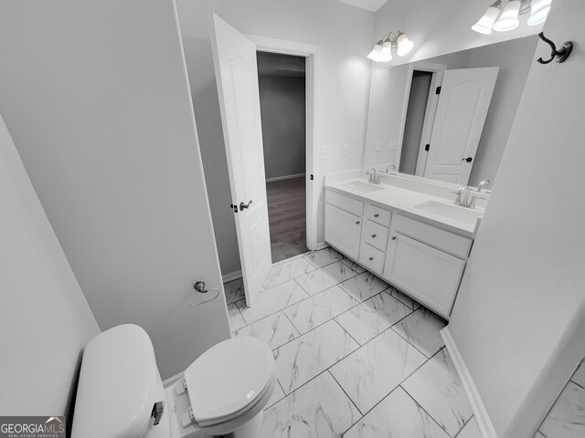 1235 Park Pass Way, Suwanee, GA 30024 - bathroom with marble finish floor, a sink, toilet, and double vanity
