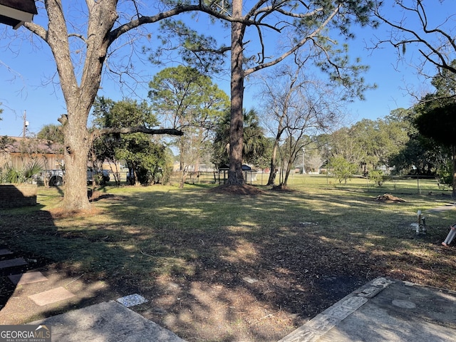 view of yard with fence