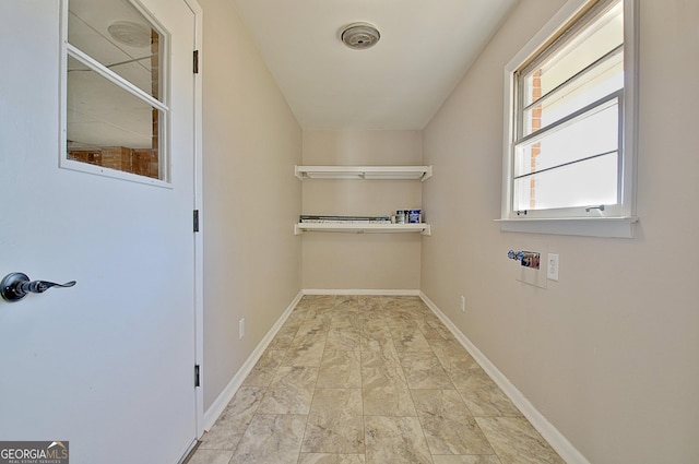 washroom featuring visible vents and baseboards