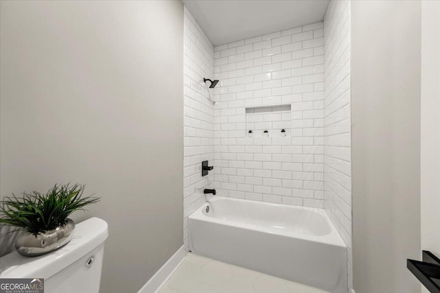 bathroom with  shower combination, baseboards, and toilet