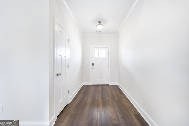 entryway with dark wood-style flooring, visible vents, crown molding, and baseboards