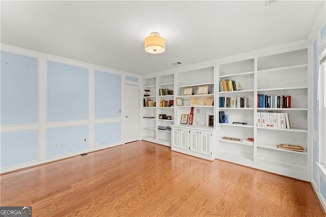 unfurnished room featuring wood finished floors