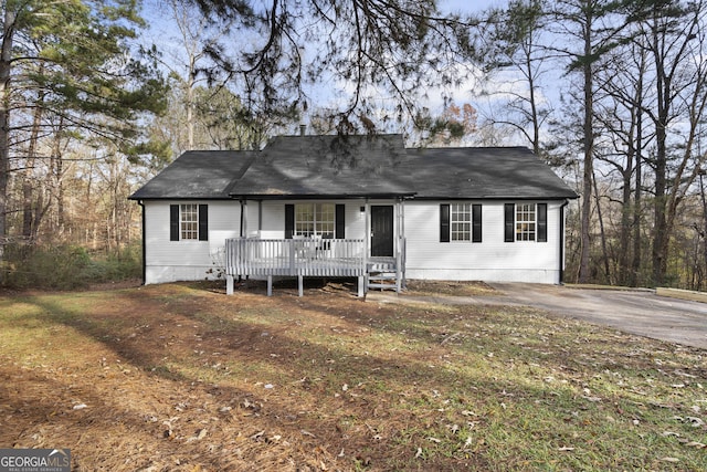 single story home with covered porch