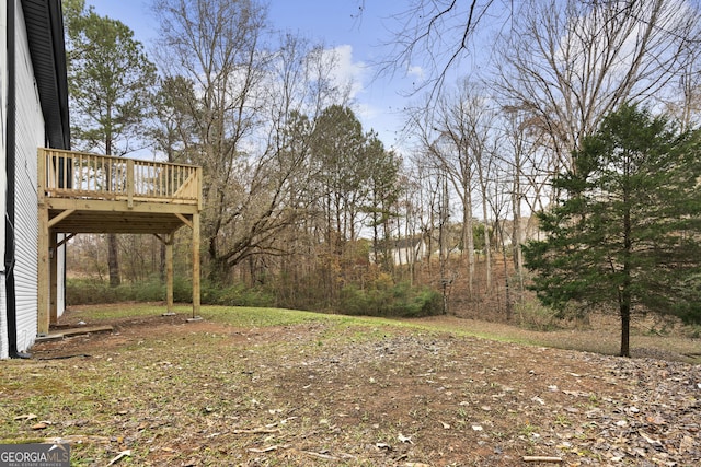 view of yard featuring a deck