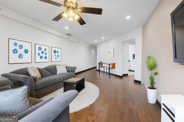 living room with recessed lighting, ceiling fan, baseboards, and wood finished floors