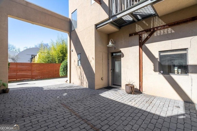 view of patio with fence