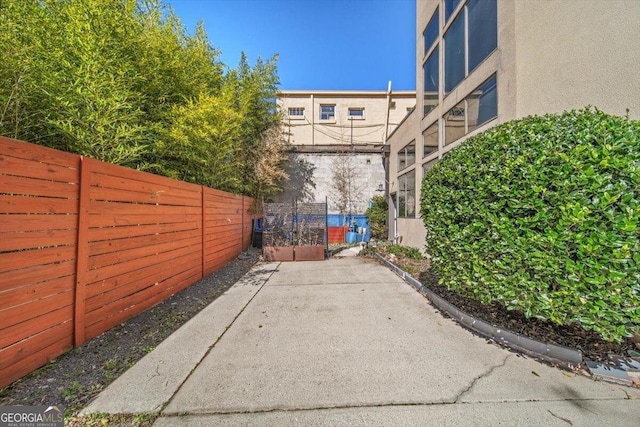 view of patio / terrace featuring fence