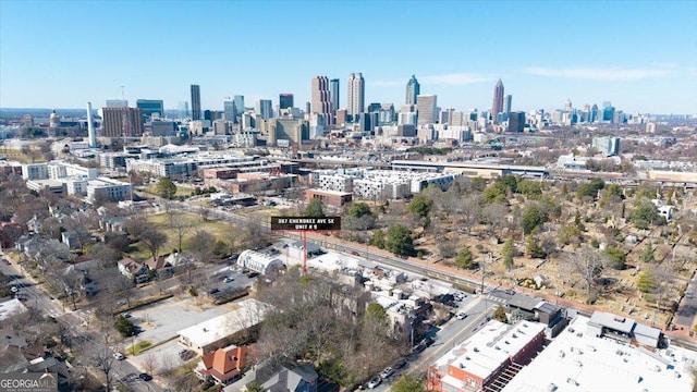 birds eye view of property with a city view