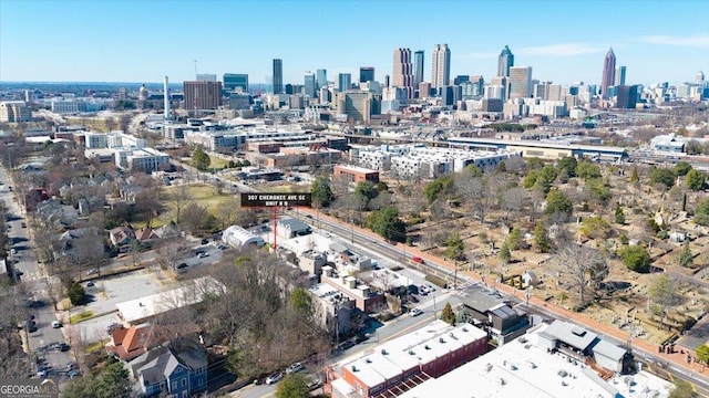 birds eye view of property featuring a view of city