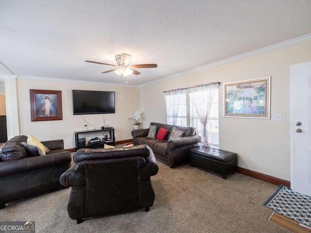 carpeted living room with baseboards, ceiling fan, and crown molding