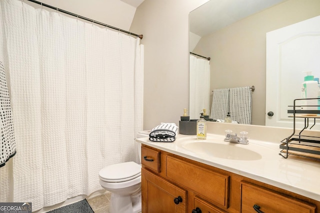 full bathroom featuring toilet, tile patterned flooring, and vanity