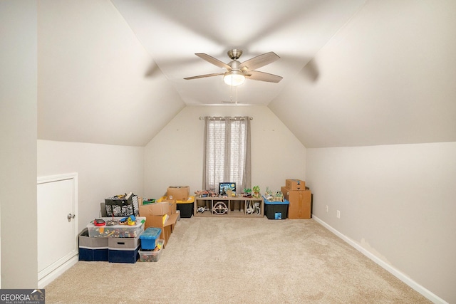 8000 Abington Dr, Locust Grove, GA 30248 - recreation room featuring carpet flooring, vaulted ceiling, ceiling fan, and baseboards
