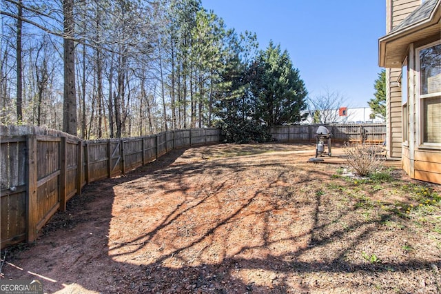 view of yard featuring a fenced backyard