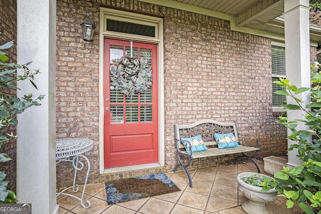 8000 Abington Dr, Locust Grove, GA 30248 - property entrance featuring brick siding and covered porch