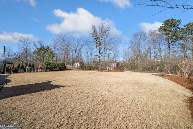 view of yard featuring fence