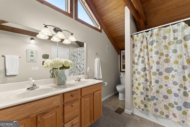 bathroom with a sink, lofted ceiling with beams, toilet, and tile patterned floors