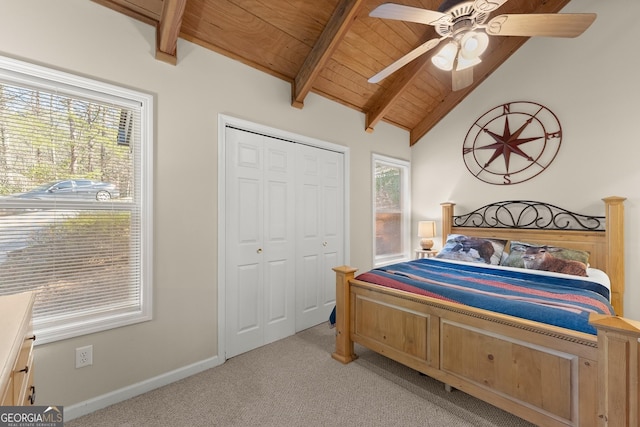 bedroom featuring wood ceiling, light carpet, lofted ceiling with beams, and multiple windows