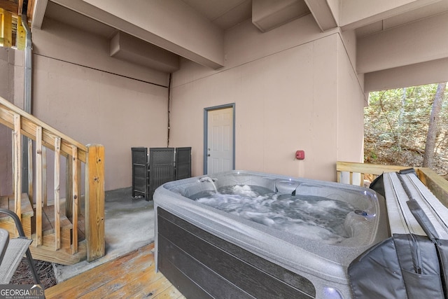 exterior space featuring a hot tub