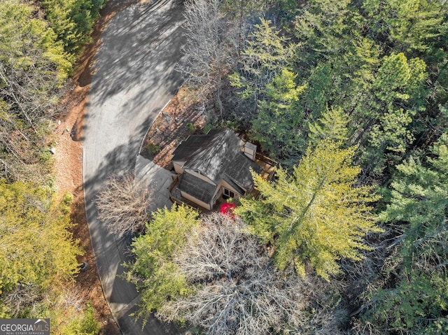 aerial view featuring a view of trees