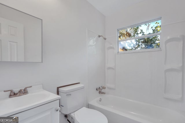 full bathroom with toilet, vanity, and shower / bathing tub combination