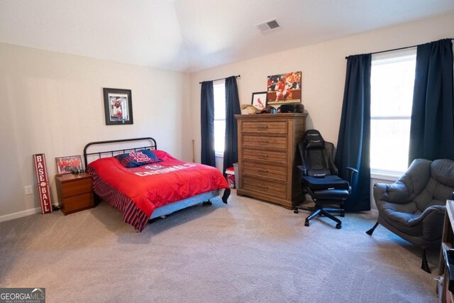 bedroom featuring carpet, visible vents, and baseboards