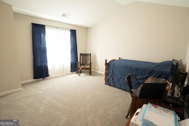 bedroom with carpet floors, visible vents, vaulted ceiling, and baseboards