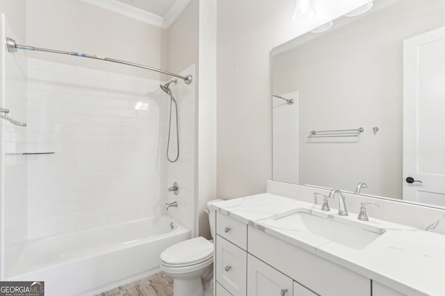 bathroom with toilet, vanity, crown molding, and shower / bathtub combination