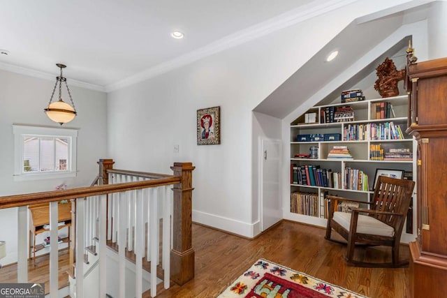 living area featuring crown molding, recessed lighting, an upstairs landing, wood finished floors, and baseboards