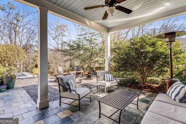 view of patio / terrace featuring ceiling fan and an outdoor hangout area