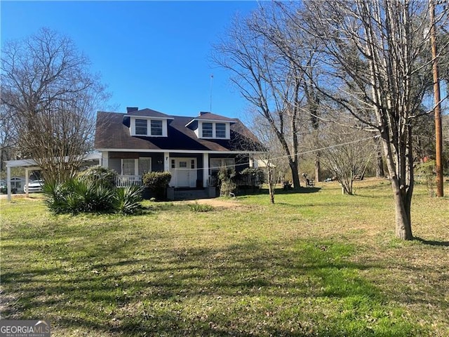 view of front of home with a front lawn