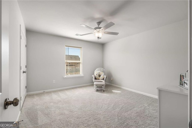 unfurnished room featuring visible vents, carpet floors, a ceiling fan, and baseboards