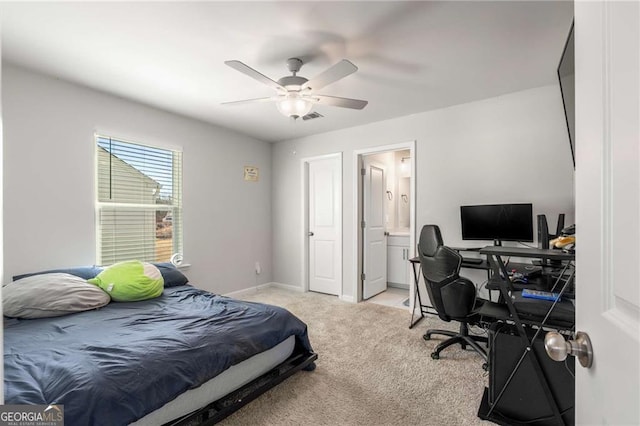 bedroom featuring visible vents, a ceiling fan, light carpet, connected bathroom, and baseboards